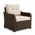 Poltrona da giardino in rattan PE marrone con cuscini beige 82 x 78 x 88 cm